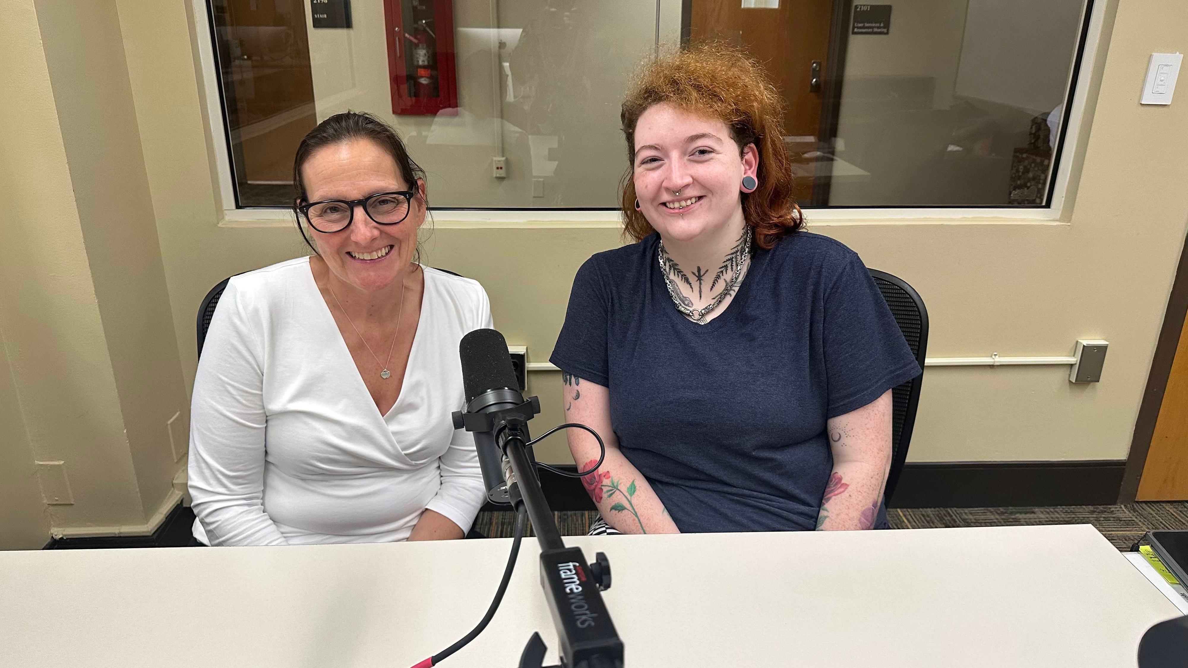 Rikki and Emily in the podcasting studio