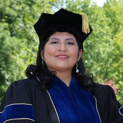 Aracely Quispe in doctoral regalia